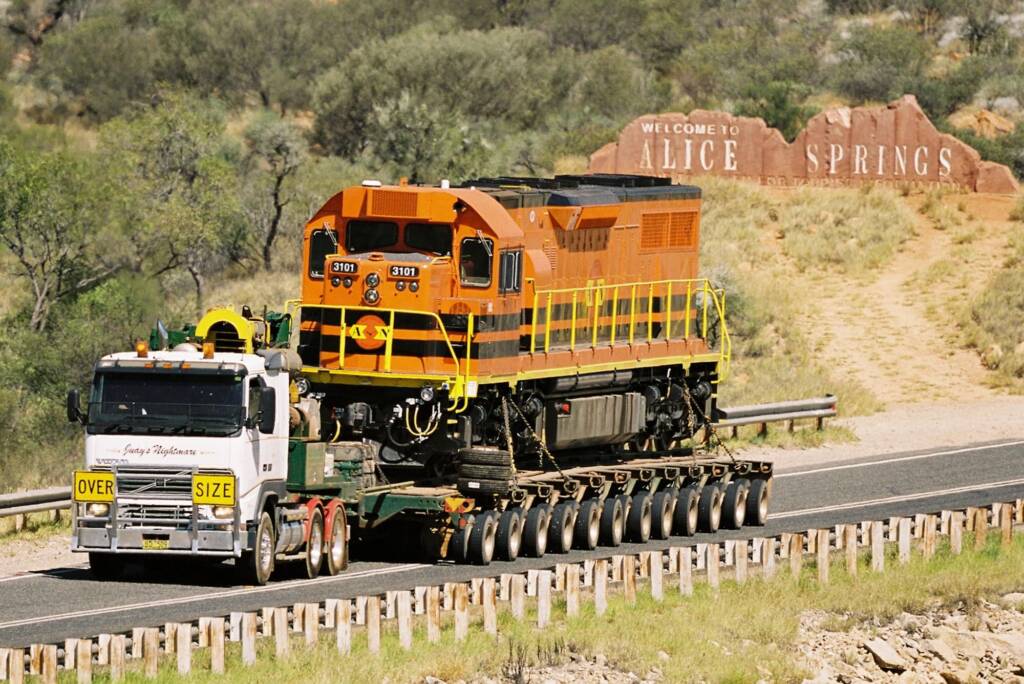 Road train with train locomotive (leaving Alice Springs) © Hans Boessum