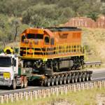 Road train with train locomotive (leaving Alice Springs) © Hans Boessum