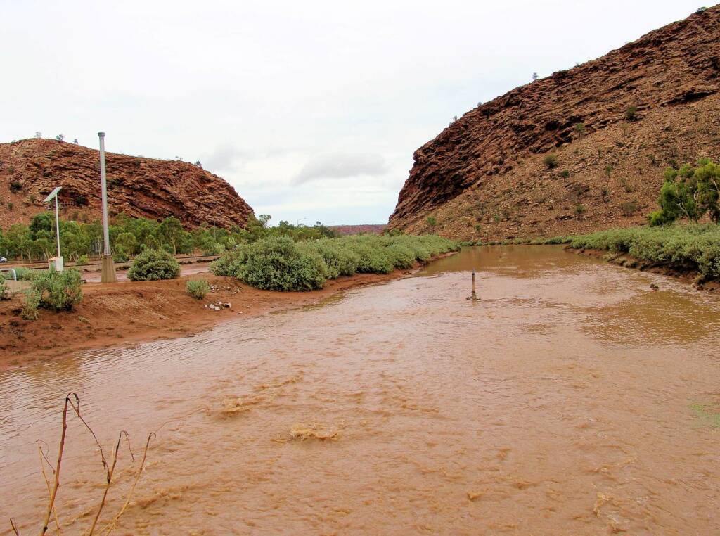 Water channels join to feed into the Todd River at Heavitree Gap, Alice Springs, 9 Jan 2010